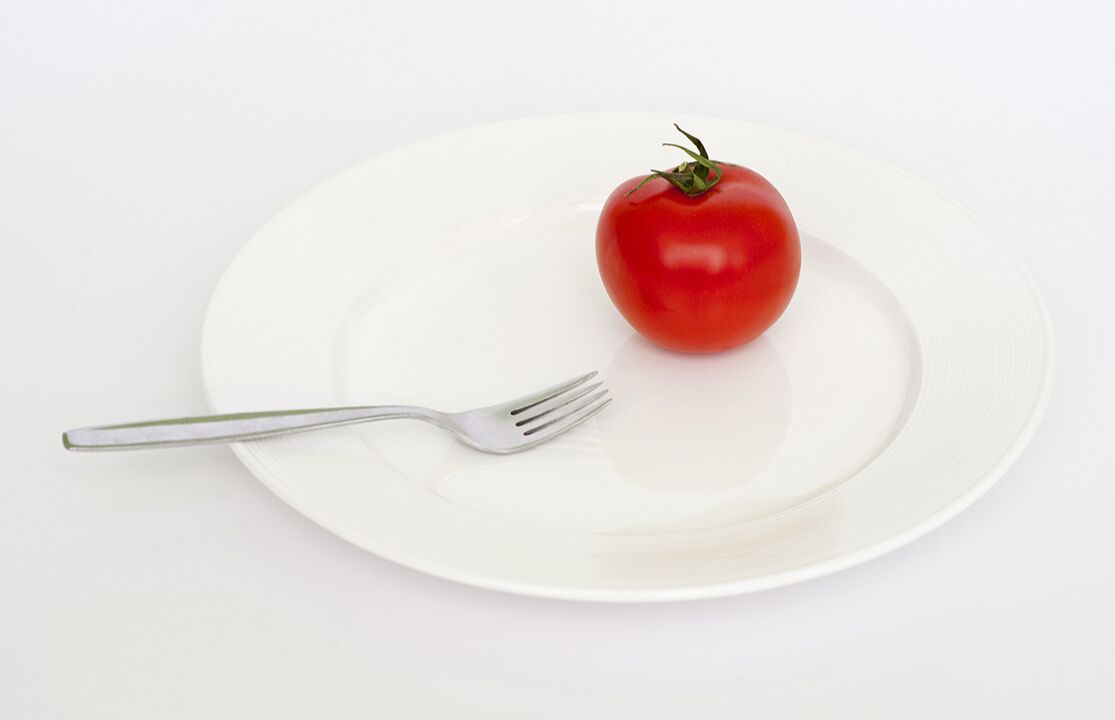 fork tomatoes on plate